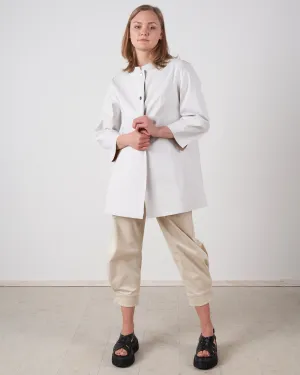 reversible waterproof mac - white/taupe